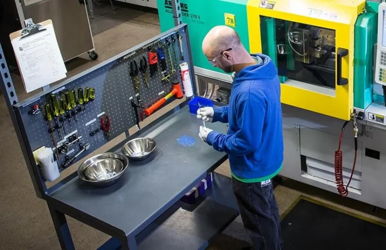 Technician working at silicone production equipment