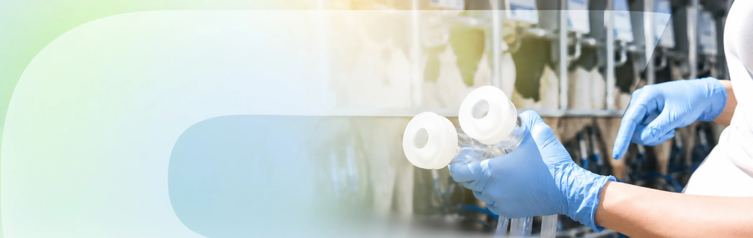 Technician holding silicone milking components
